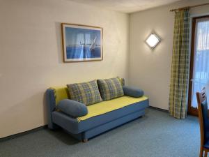 a living room with a couch in a room at Apartment Christina by Interhome in Tarrenz
