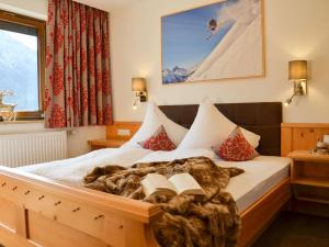 Postel nebo postele na pokoji v ubytování Apartment Wechner-1 by Interhome