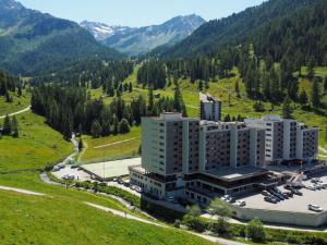 an aerial view of a building in the mountains at Apartment Rosablanche C22 by Interhome in Siviez