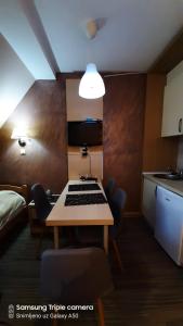 Kuchyň nebo kuchyňský kout v ubytování S Konaci