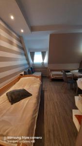 Postel nebo postele na pokoji v ubytování S Konaci