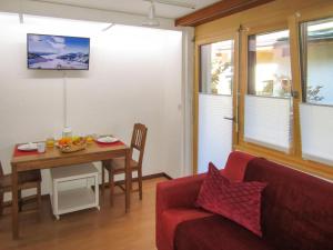 Posezení v ubytování Apartment Sungold-1 by Interhome
