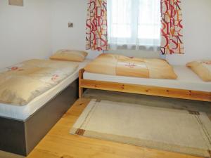 Posteľ alebo postele v izbe v ubytovaní Apartment Dobler by Interhome