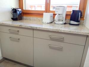 Kuchyň nebo kuchyňský kout v ubytování Apartment Eaux-Vives 202 by Interhome