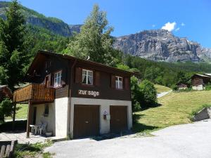 a building with a zil stop written on the side at Chalet Zur Säge by Interhome in Albinen