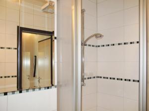 Koupelna v ubytování Apartment Ostsee-Residenz - DMP173 by Interhome