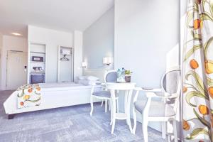 Кровать или кровати в номере Continental Forum Constanta