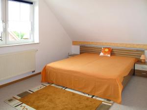 Postel nebo postele na pokoji v ubytování Holiday Home Tjarks by Interhome