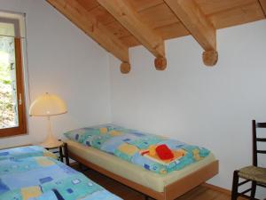 Postel nebo postele na pokoji v ubytování Holiday Home Rustico Dara Cotta by Interhome