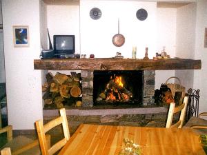 TV a/nebo společenská místnost v ubytování Holiday Home Rustico Dara Cotta by Interhome