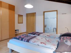 Postel nebo postele na pokoji v ubytování Apartment von Allmen by Interhome