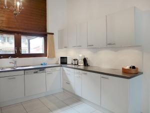 Kuchyň nebo kuchyňský kout v ubytování Apartment von Allmen by Interhome + 11 fotografií