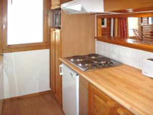 Cuina o zona de cuina de Apartment Plagne Villages 2 - LAP416 by Interhome