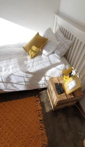 Ένα ή περισσότερα κρεβάτια σε δωμάτιο στο Delikaat Bed & Coffee