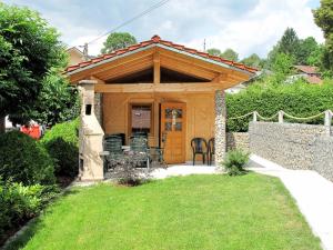 a gazebo with a table and chairs in a yard at Holiday Home Triendl by Interhome in Bischofsmais