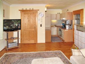 Kuchyň nebo kuchyňský kout v ubytování Holiday Home Paula by Interhome