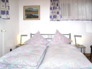 Postel nebo postele na pokoji v ubytování Holiday Home Paula by Interhome