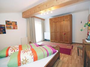 Posteľ alebo postele v izbe v ubytovaní Apartment Hundsbichler-1 by Interhome + 11 fotografií