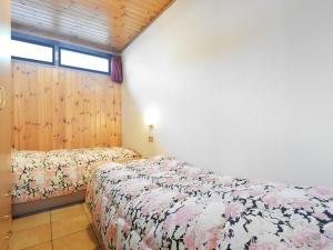 a bedroom with two beds and a window at Apartment Cincelli - Marmolada by Interhome in Pozza di Fassa +49 photos