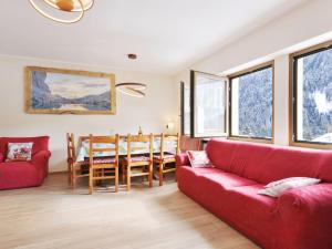 A seating area at Apartment Bernard-3 by Interhome