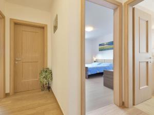 A bed or beds in a room at Apartment Bernard-3 by Interhome Még 27 kép