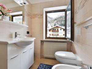 A bathroom at Apartment Bernard-3 by Interhome