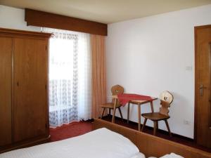 Кровать или кровати в номере Apartment Haupthaus Schönblick - SVH121 by Interhome