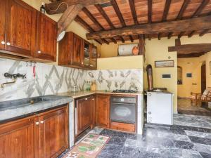 A kitchen or kitchenette at Holiday Home Agrumi by Interhome