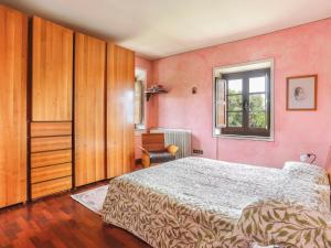 A bed or beds in a room at Holiday Home Agrumi by Interhome Még 29 kép