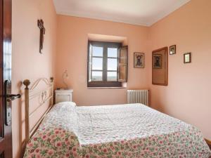 A bed or beds in a room at Holiday Home Agrumi by Interhome