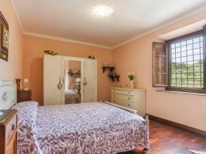 A bed or beds in a room at Holiday Home Agrumi by Interhome