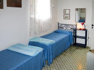 Posteľ alebo postele v izbe v ubytovaní Apartment Sulla Scogliera by Interhome