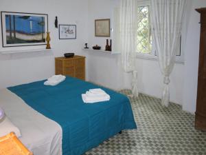 Posteľ alebo postele v izbe v ubytovaní Apartment Sulla Scogliera by Interhome