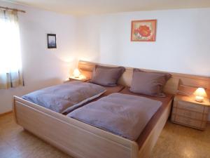 Ліжко або ліжка в номері Apartment Bless by Interhome