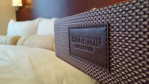 Llit o llits en una habitació de Brighton Hotel Hong Kong
