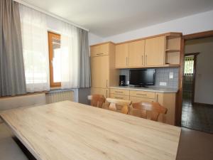 A kitchen or kitchenette at Holiday Home Chalet Alpin by Interhome