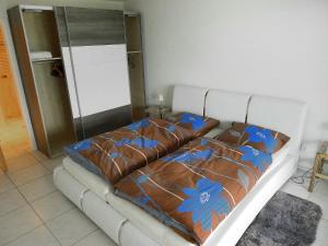 Llit o llits en una habitació de Apartment Hegglistrasse 9-1 by Interhome