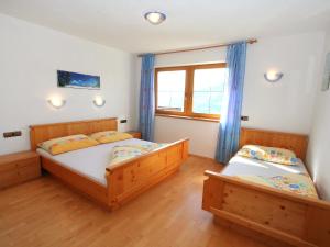 Posteľ alebo postele v izbe v ubytovaní Apartment Hansjörg-5 by Interhome