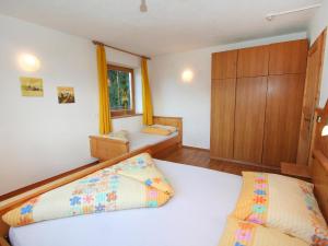 Posteľ alebo postele v izbe v ubytovaní Apartment Hansjörg-5 by Interhome