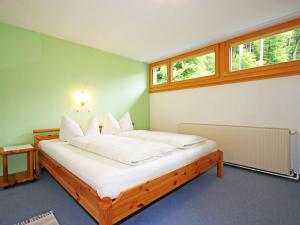 A bed or beds in a room at Holiday Home Josefine by Interhome