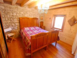 Posteľ alebo postele v izbe v ubytovaní Apartment Albergo Diffuso - Cjasa Ustin-3 by Interhome