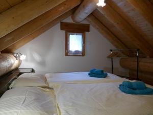 Postel nebo postele na pokoji v ubytování Holiday Home Rustico Diego by Interhome