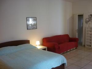A bed or beds in a room at bigari 1