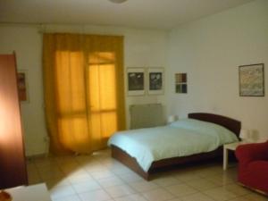 A bed or beds in a room at bigari 1 Még 3 kép