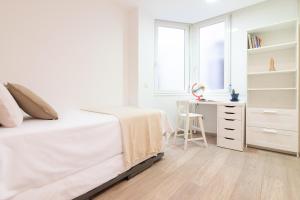 Posteľ alebo postele v izbe v ubytovaní Sea & Wave Mendoza Apartment