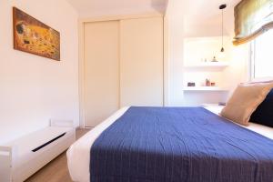 Posteľ alebo postele v izbe v ubytovaní Sea & Wave Mendoza Apartment