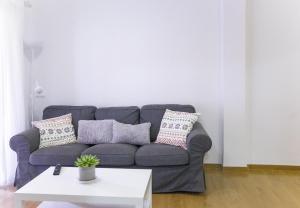 A seating area at Sea & Wave Don Cristian Apartment