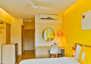 Postel nebo postele na pokoji v ubytování Bloom Hotel - Juhu