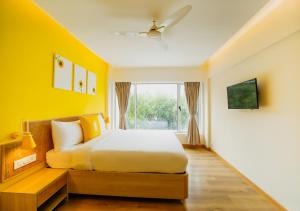 TV a/nebo společenská místnost v ubytování Bloom Hotel - Juhu