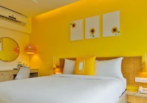 Postel nebo postele na pokoji v ubytování Bloom Hotel - Juhu + 18 fotografií